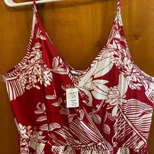 I'm selling a red and white jumpsuit, it has never been worn, it's supper pretty